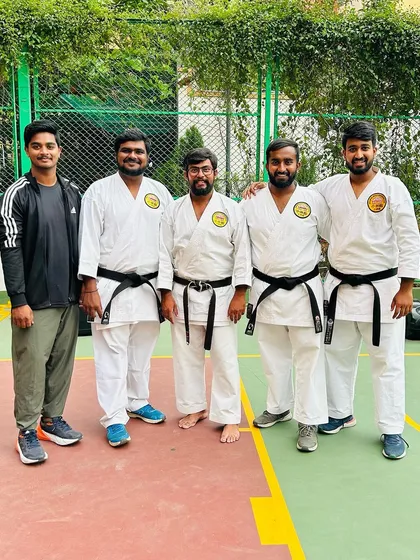 A group of my senior black belt students and instructors. Their journey is a testament to the principle that discipline leads to habits, consistency, and finally, growth.