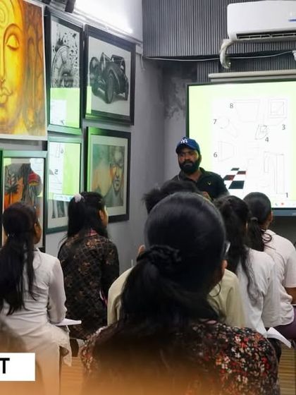 The classroom is always buzzing with creative energy. Here, students are focused on a digital lesson, an integral part of our fine art diploma program.