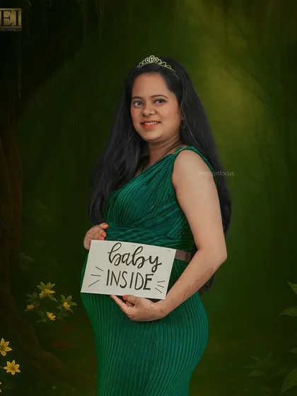 We have a variety of fun props, like this "Baby Inside" sign, to add a playful touch to your photos.