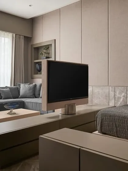 This is the guest room side of the rotating TV console. The custom unit allows the television to be enjoyed from the bed, making the space a private retreat for visitors while maintaining a clean, uncluttered look.