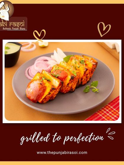 Grilled to perfection. Our Paneer Tikka is a testament to the art of tandoori cooking, offering crispy edges and a soft, melt-in-your-mouth texture.