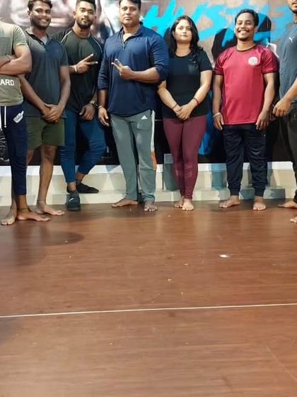 Another group shot of my dedicated athletes. The camaraderie here is as important as the weights we lift.