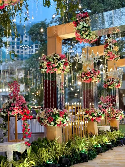 A side view of the entrance structure, showing the layers of flowers, crystals, and lighting that create this opulent look.
