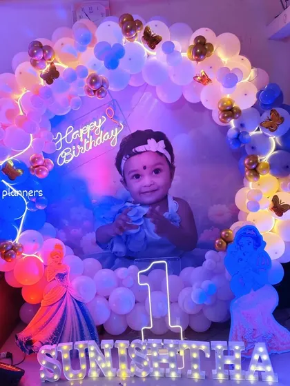The princess birthday setup with cool blue lighting for a magical feel.