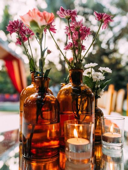 The perfect setting for a pre-wedding cocktail party or sangeet night. The lawn provides ample space for a dance floor, while the surrounding trees, lit with elegant chandeliers and string lights, create a festive and celebratory atmosphere.