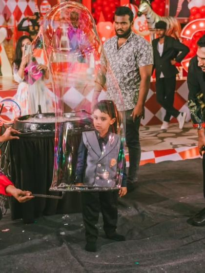 A magical moment as the birthday boy is enclosed in a giant bubble. This is the kind of unique, memorable experience I strive to create at every child's party.