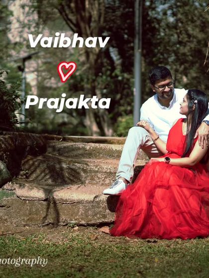 A classic couple portrait in a park setting. Their relaxed poses and happy expressions perfectly capture the feeling of their post-wedding glow.