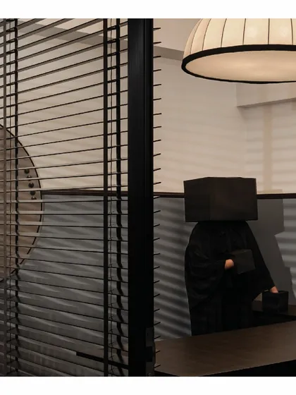 A unique identity is given to each room in the 'Shadows' office through a custom, large-scale light installation. These lights, visible through the glass walls, become highlights of the space and give each cabin its own character.