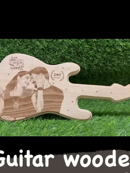A unique gift for the music lover in your life. This wooden guitar-shaped plaque can be engraved with your photo and a special message.