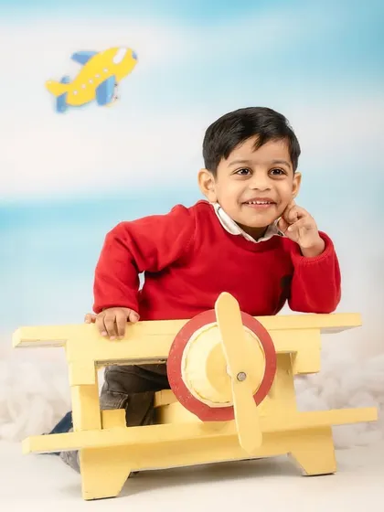 Adventure is out there. This little pilot was all smiles during his travel-themed milestone shoot, ready to explore the world from the comfort of my studio.