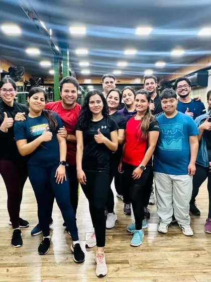 Another shot from our happy hour. Thumbs up for a great workout and even better company.