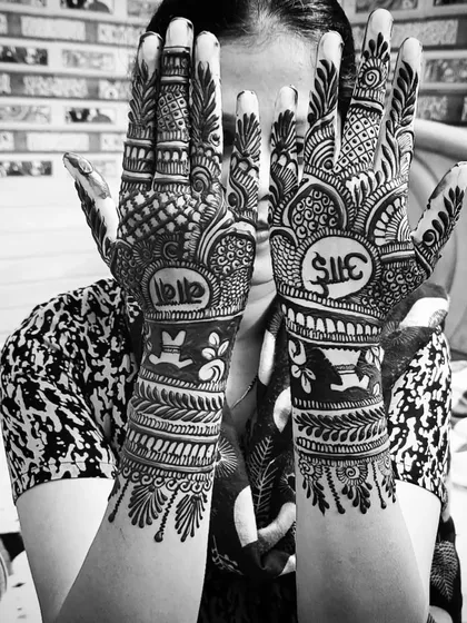 A black and white version of the "Aai-Baba" design, which beautifully highlights the contrast and line work of the art.