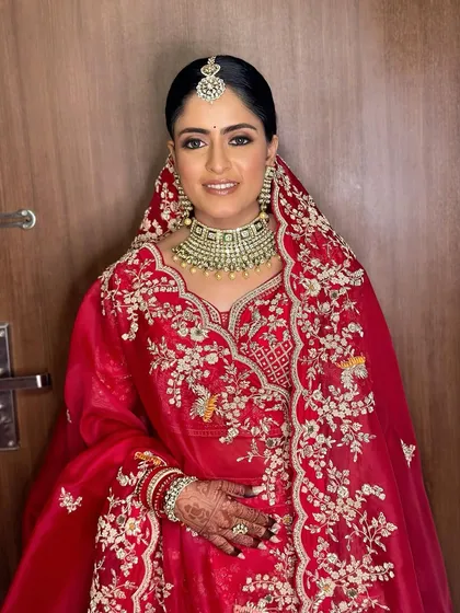 The full bridal look, ready for the ceremony. The makeup is designed to be both photogenic and long-lasting.