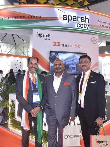 Our leadership team with a valued partner at FSIE 2025. These connections help us shine brighter and keep moving forward with our mission of smart security.