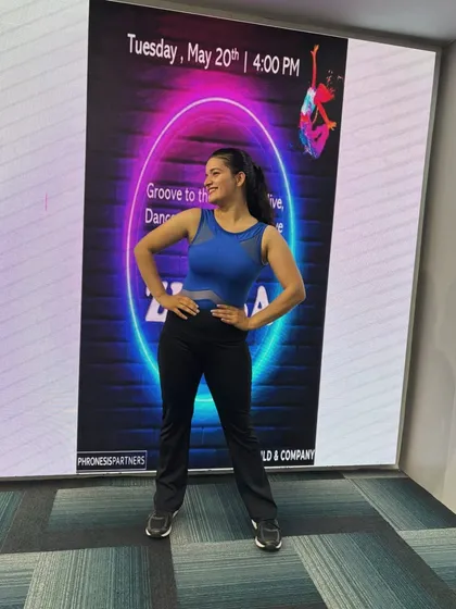 Feeling pumped and ready before a corporate Zumba session. I always bring my A-game to make sure your team has an unforgettable fitness experience.