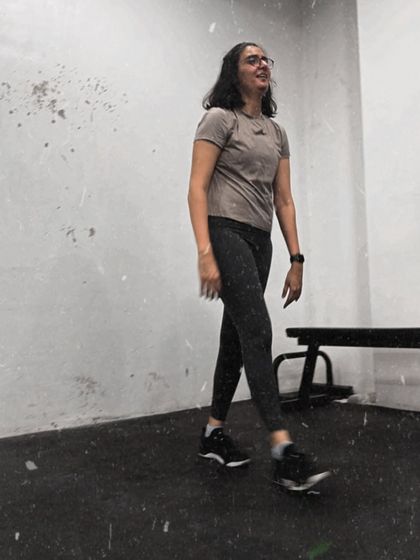 A candid moment of a member walking through the gym after a workout. The look of satisfaction and exhaustion is a familiar sight here.