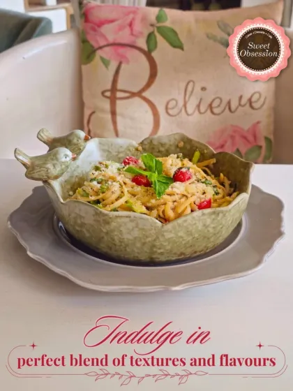 I believe in beautiful presentation for every dish. This pasta is served in a unique bird-themed bowl, adding a touch of whimsy to your dining experience.