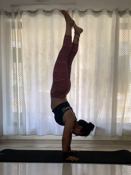 Handstanding at my new place. It feels so good to find your balance, no matter where you are. This pose is a testament to what consistent practice can achieve.