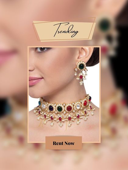A mesmerizing Navratna Kundan choker with multi-colored stones. This jewelry set comes with matching earrings to enhance your elegance and add a rainbow of colors.