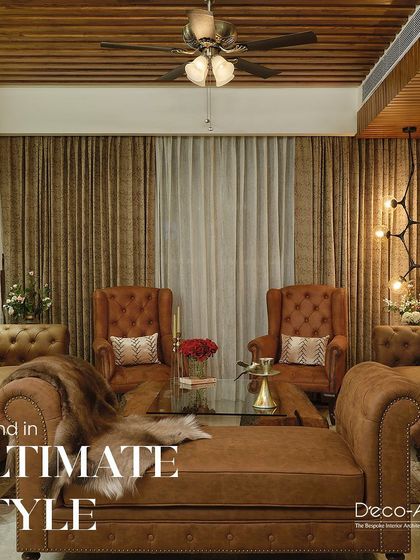 Create a sanctuary of elegance and comfort with this sophisticated living room design. The rich leather armchairs, wooden ceiling, and ambient lighting create a warm and luxurious space to unwind in ultimate style.