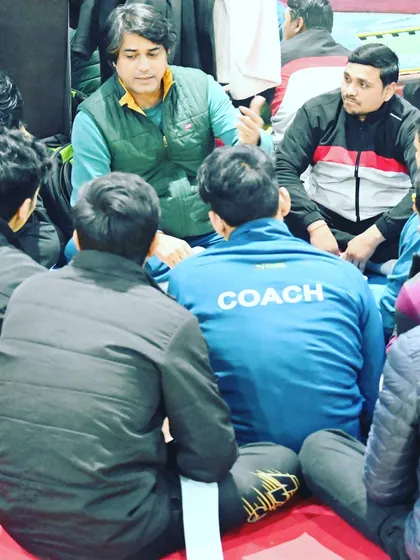 A moment of mentorship. I believe in talking with my coaches and students, sharing insights and motivation.