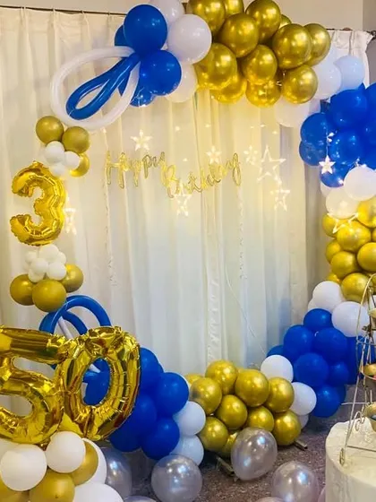We love celebrating big milestones. This elegant blue, white, and gold balloon ring was for a special 50th birthday celebration. We can create sophisticated party decor for adults, perfect for making any milestone birthday memorable.
