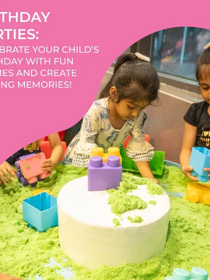 Our play areas are designed for fun and learning. Here, kids are engaged in sensory play with kinetic sand and building blocks.