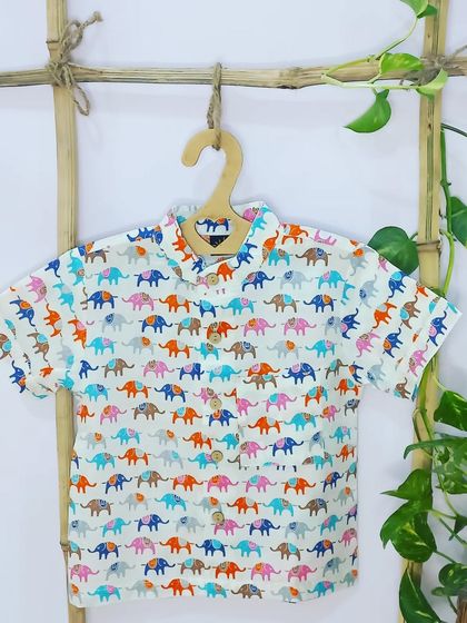 Did you know this shirt is named after an Oscar-winning documentary? Our 'Elephant Whisperer' shirt celebrates the beauty of these gentle giants with a fun, colorful print.