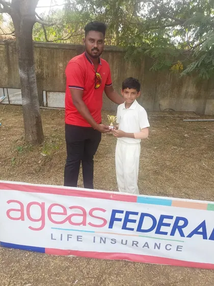 Our U-11 player Viraj Patil receiving the 'Man of the Match' trophy for his performance in the Federal Cup.