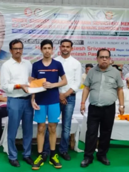 **Receiving the Prize.** An athlete being awarded at the 2nd U.P. State U-15 and U-17 Tournament prize distribution ceremony.
