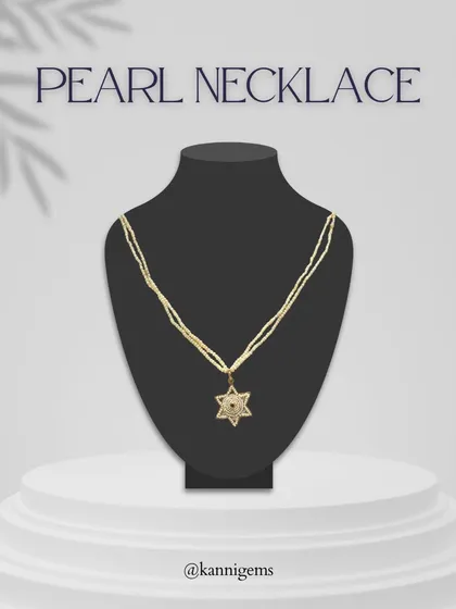 Effortlessly chic and endlessly versatile, this white gold necklace with a star-shaped pearl and diamond pendant is designed to complement every moment. Its subtle shimmer adds the perfect touch of sophistication.