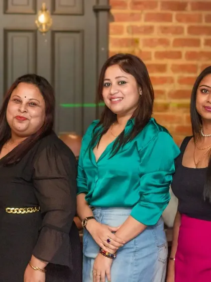 A group of friends looking stylish and happy.