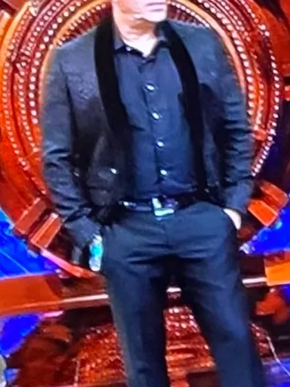 The final look for Salman Khan on the Bigg Boss 16 finale. I paired the custom black jacquard jacket with a black shirt featuring embellished buttons and classic wool trousers for a sharp, elegant finish.