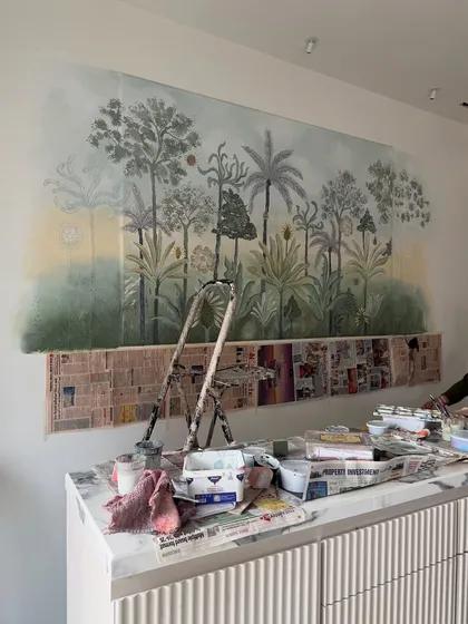Another work-in-progress shot of the 3D mural, showing the initial layers of ceramic paste and paint. It’s amazing to see how a blank wall can be transformed into such a detailed piece of art.