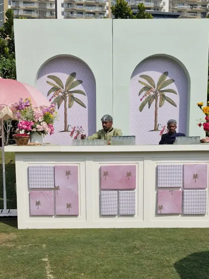 Our professional bartenders serving guests from the beautifully designed bar. We ensure that every functional aspect of your event is also aesthetically pleasing.
