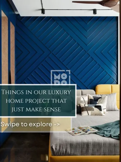 This image introduces a series on the little luxuries that make a big difference. The bold blue accent wall and contrasting yellow headboard are just the beginning.