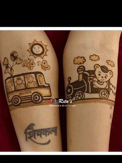 A close-up of the arm design, featuring a cute teddy bear driving a train and a school bus full of happy kids under a smiling sun.