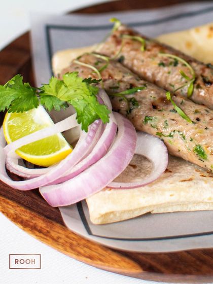 Gulkand Chicken Seekh with Rumali Roti from our "Rooh of Awadh" pop-up. The subtle sweetness of rose petal preserve in the kebab was a unique and delicious twist.