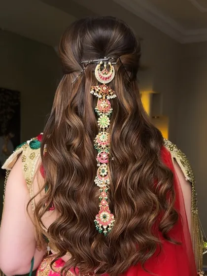 A close-up of the magnificent hair accessory, showing how it is seamlessly integrated into the half-up hairstyle.