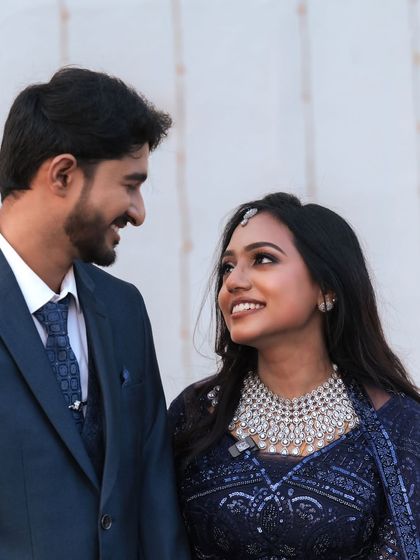 Another romantic portrait of the couple. The soft focus and their loving gaze create a beautiful and timeless image.