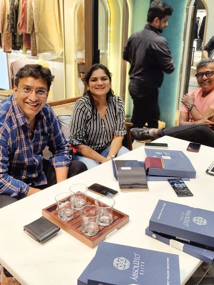 A happy group during a consultation. We love involving family in the process to ensure the final garment is something everyone is excited about.