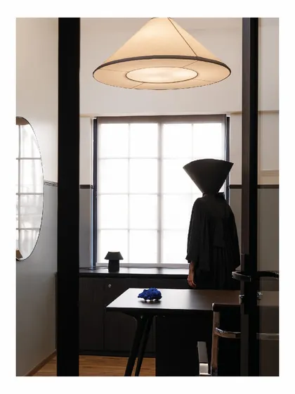 This image captures the mood of the 'Shadows' office, inspired by the swift movement of lawyers in their black gowns. The design aims to evoke an air of myth, mystery, and authority through its use of shadow and light.