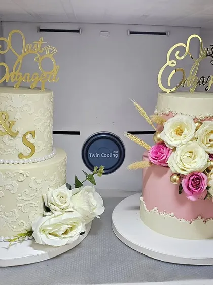 My fridge view, with two beautiful engagement cakes ready to go to their respective celebrations.