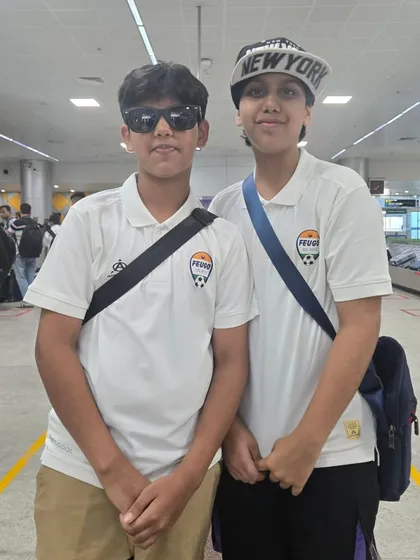 Teammates at the airport, showing off their style before the flight.