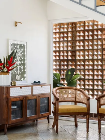 Pieces from the Dhara Residence, including the Ruba Bar Chair, Sirutha console, and Ruba armchair. This project highlights our ability to create contemporary yet warm furniture that complements modern architecture.