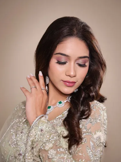 A close-up on the soft, romantic eye makeup and flawless skin. This is a great example of a look that is both gentle and glamorous.