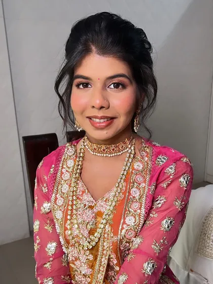 Sider makeup and hair for the lovely Utsavi. A soft, pretty look that is perfect for a wedding celebration.
