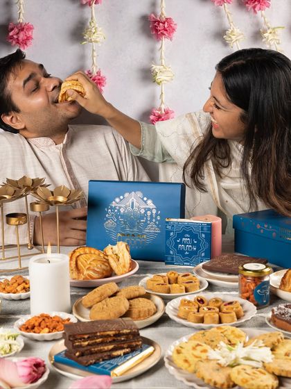 Another playful moment between siblings enjoying our Diwali spread. Good food and good company are what festivals are all about.