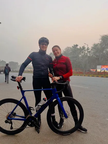 A couple from our group posing for a photo during a break on our 80km spin. We love seeing our members share their passion.
