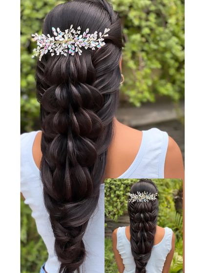 A beautiful open hairstyle with a thick, pulled-apart braid, finished with a crystal hair accessory.
